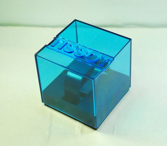 TISSOT rara scatola a cubo in plexyglass azzurro - RIMANENZA DI MAGAZZINO anni '70
