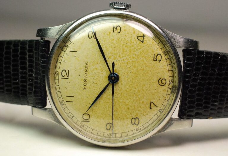 ( SOLD ) LONGINES steel case watch - diameter 35mm - calibrer 12.68ZS with central seconds - produced in 1948