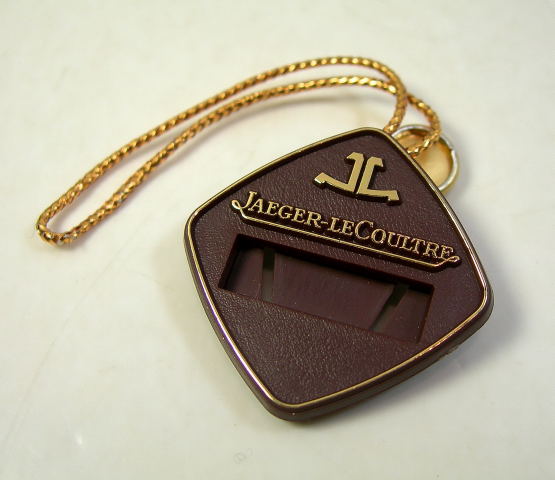 JAEGER LE COULTRE cartellino / tag in plastica marrone - RIMANENZA DI MAGAZZINO anni '70
