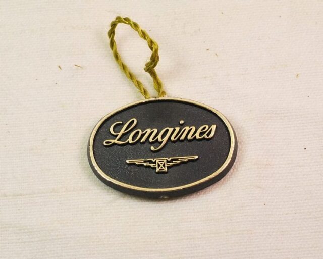 LONGINES cartellino in plastica - ottime condizioni di conservazione