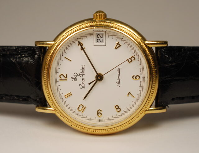 LUCIEN ROCHAT automatic - heavy case in 18k yellow gold - exceptional storage conditions with original box, strap and buckle