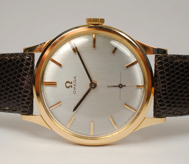 ( VENDUTO IN ITALIA ) OMEGA ref. BA121.009 cassa oro rosa 18k - particolare quadrante fuori serie con lavorazione a sottili coste verticali - anno 1962