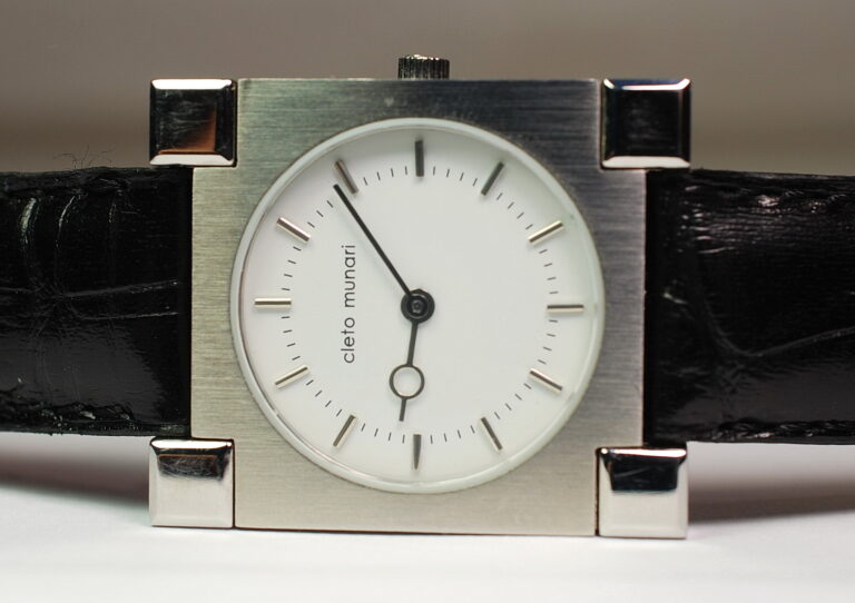 ( SOLD IN ITALY ) ETTORE SOTTSASS for CLETO MUNARI shaped watch with steel case - limited edition 500pcs - NEW OLD STOCK with box and guarantee