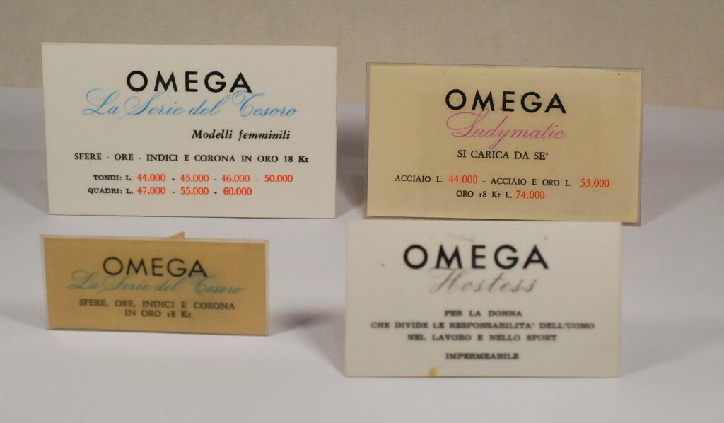 OMEGA serie di 4 piccoli espositori in carta plastificata - originali anni '50