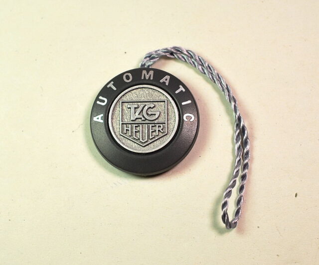 TAG HEUER automatic - gray plastic tag - modern production - new