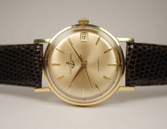 ( VENDUTO IN ITALIA ) ULYSSE NARDIN automatic raro ed elegante orologio da uomo con cassa impermeabile a moneta in oro giallo 18k ( 750/°° ) prodotto presumibilmente negli anni '60