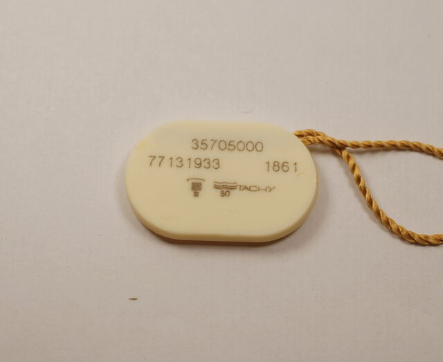 OMEGA plastic tag - for Omega Speedmaster Professional ref. 3570.5000 - caliber 1861 - 2000s